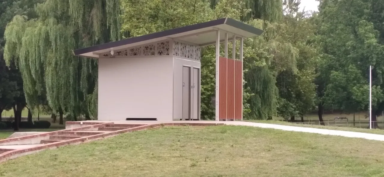 Modern public toilet block in park